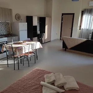 https://johns-apartments.hotelschalkidiki.net